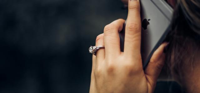 woman talking on the phone by Taylor Grote courtesy of Unsplash.